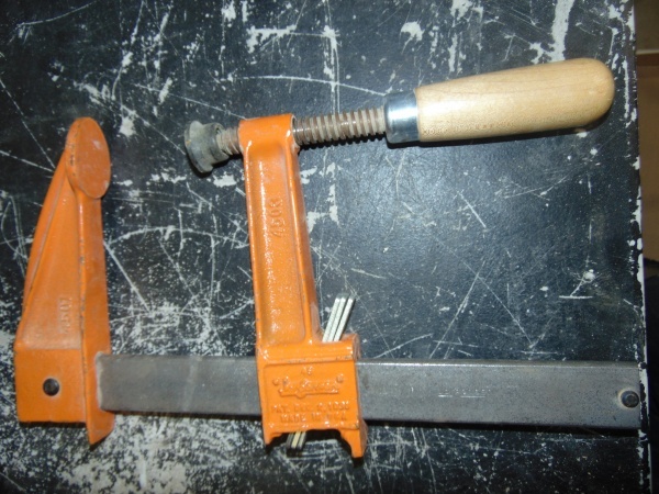 Orange woodworking clamps