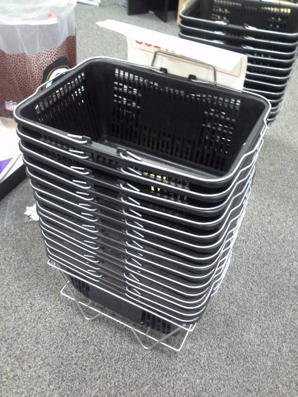 Stack of shopping baskets with stand Complete Party/Dollar Store