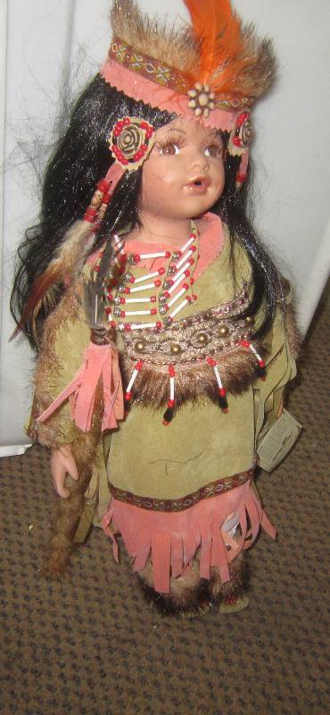 golden keepsake indian doll