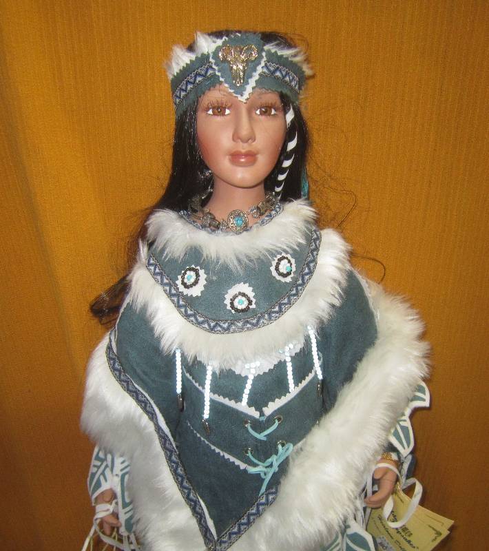 golden keepsake indian doll