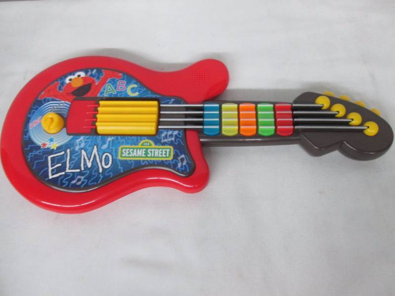 elmo guitar doll