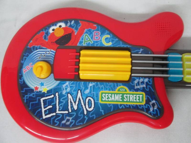 elmo guitar doll