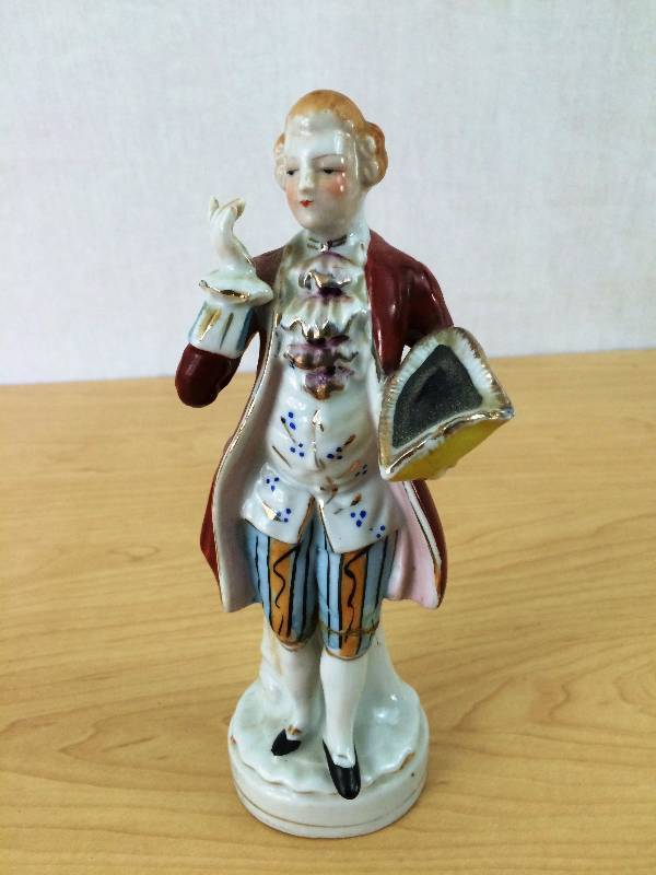 antique colonial figurines