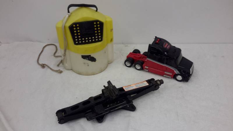 lot 10 image: Toy truck, jack, minnow bucket