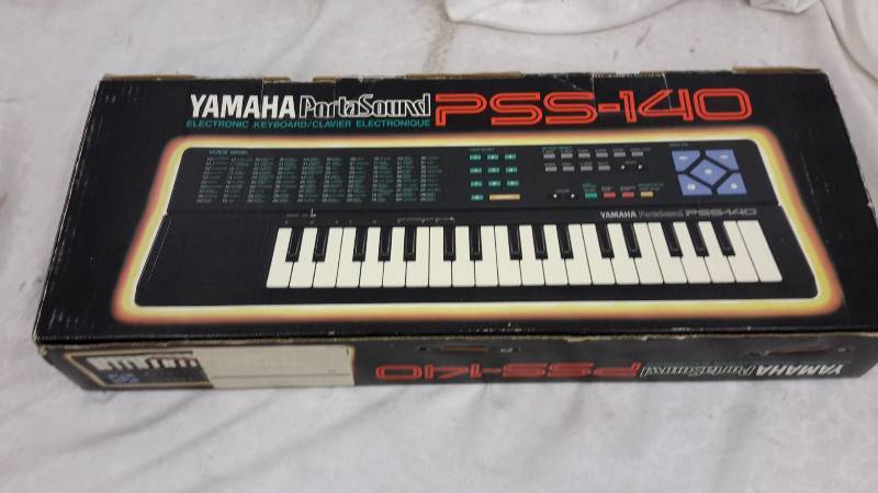 lot 32 image: Yamaha electric keyboard