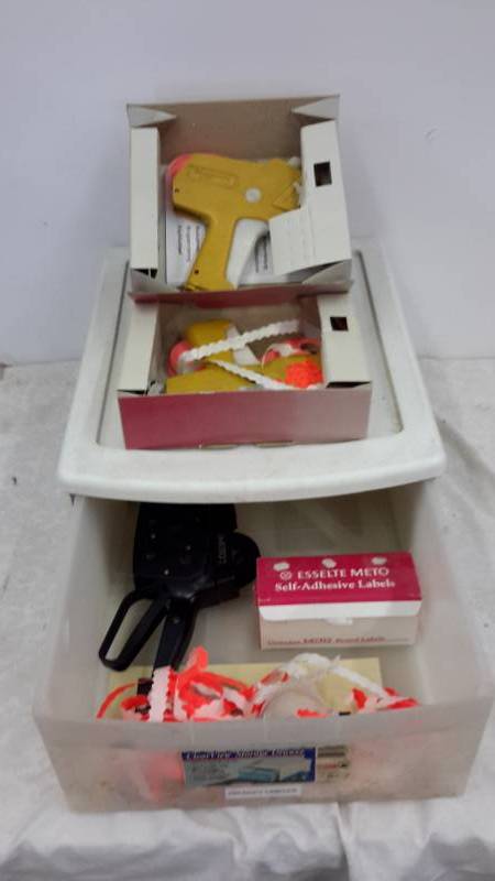 lot 60 image: Storage drawer full of price guns