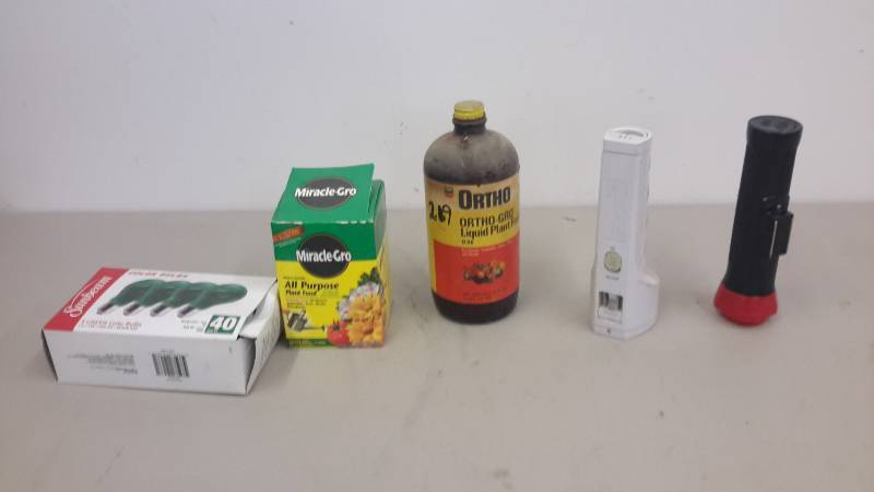 lot 69 image: Plant foods and flashlights, green bulbs