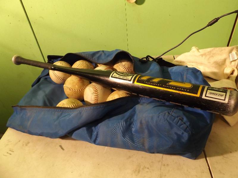 lot 82 image: Louisville Slugger Soft Ball Bat and Soft Balls in Case