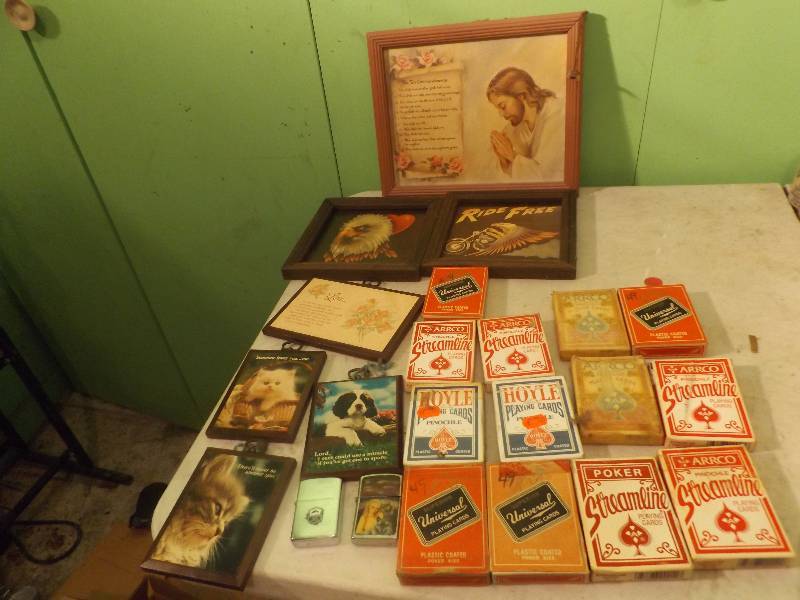 lot 127 image: Zippo Lighters, Placks, and Cards