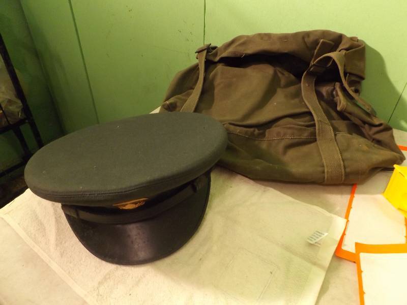 lot 169 image: Military hat and back pack