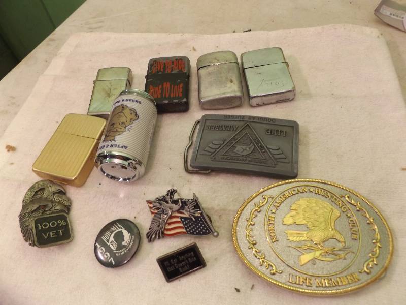lot 188 image: Lighters, Zippos, Pins and Belt Buckles
