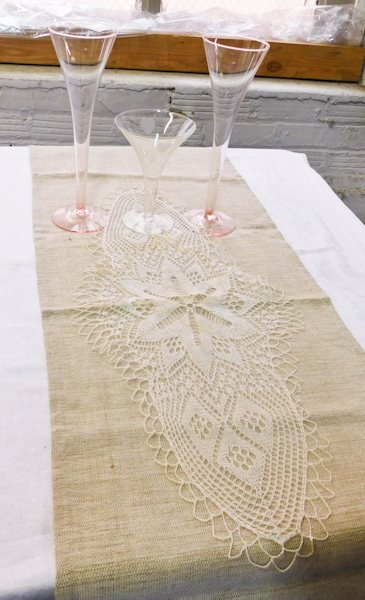 Beautiful woven Swedish Table runner doily and stemware