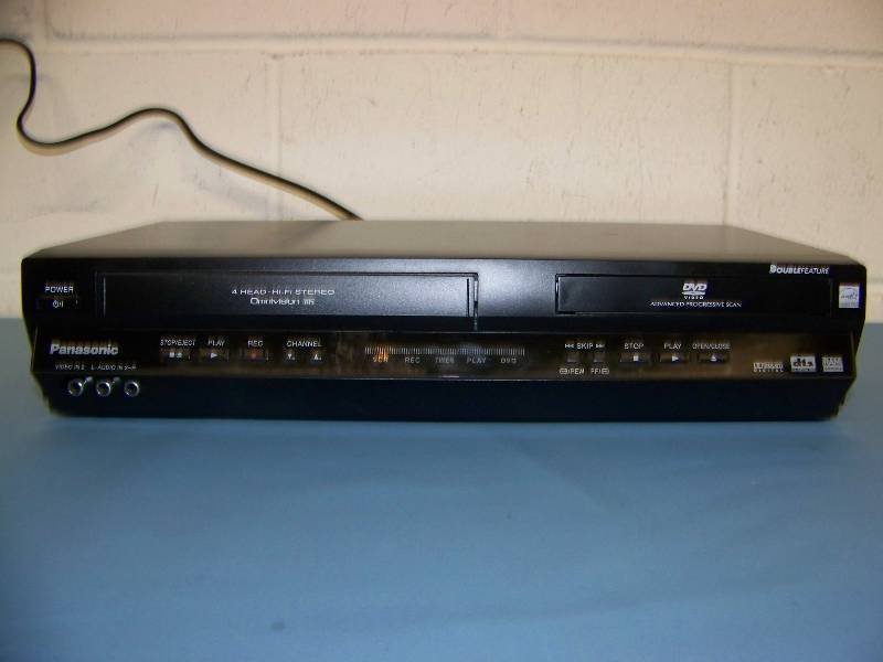 lot 50 image: Panasonic, DVD  VCR Combo Player with Remote Control