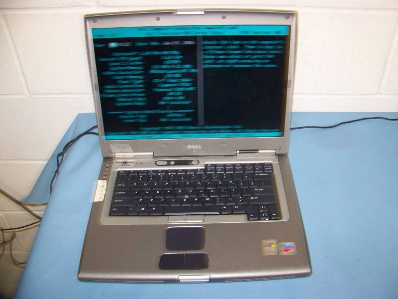 lot 64 image: (2) Dell and (1) HP  Hewlitt Packard Laptops