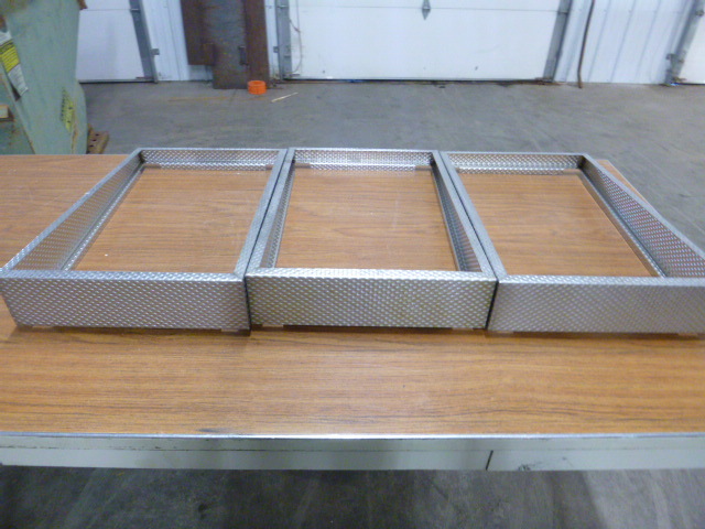 lot 128 image: 3 Steam Table Risers