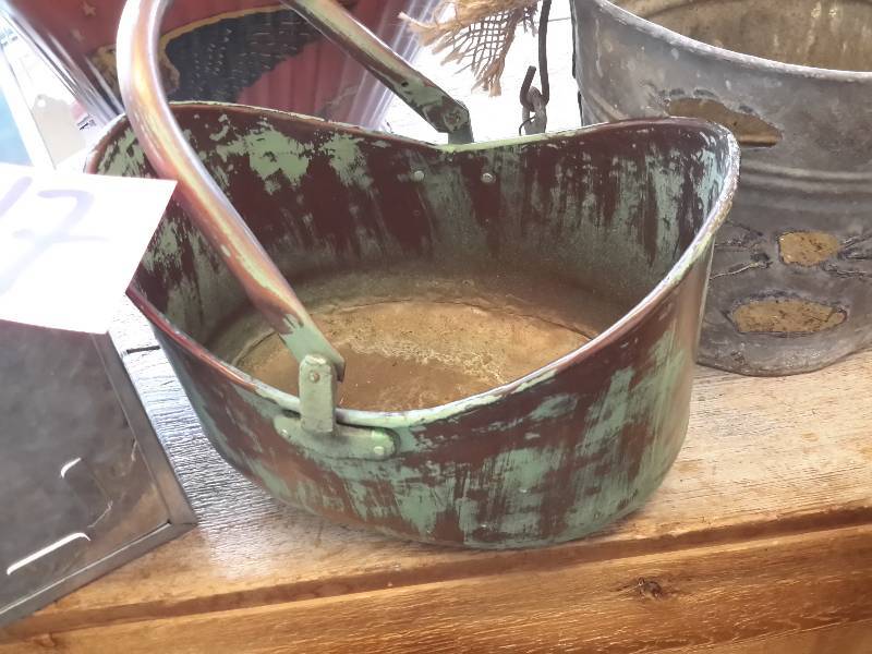 lot 17 image: 4 Metal containers.  1, coal pail with eagle, galvanized pail has some holes.  Galvanized square bin, copper bucket with handle