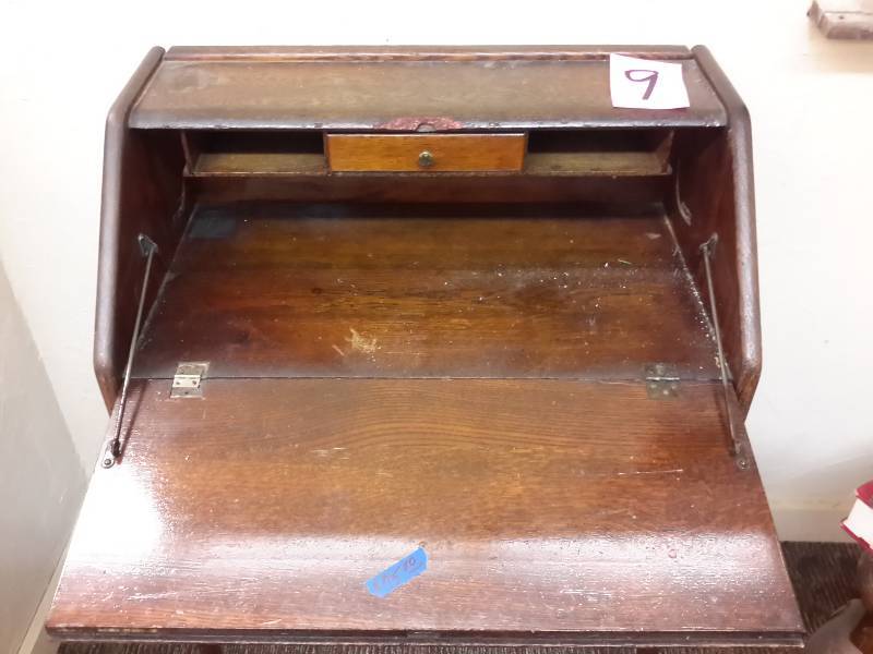 lot 9 image: OAK Secretary.. 24 in w x 14 in d x 37 in h.. Has some damage on top middle as shown.