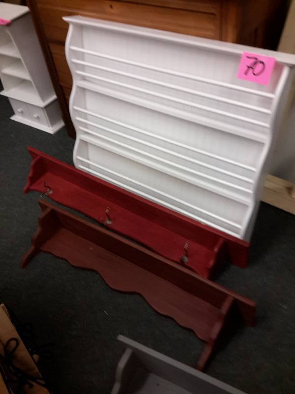 lot 70 image: 3 wood wall shelves.. One looks to be a magazine rack.. Approx 36in w x 4in deep x 27in h  2, approx. 36in w x 4 in deep x 6 in h.