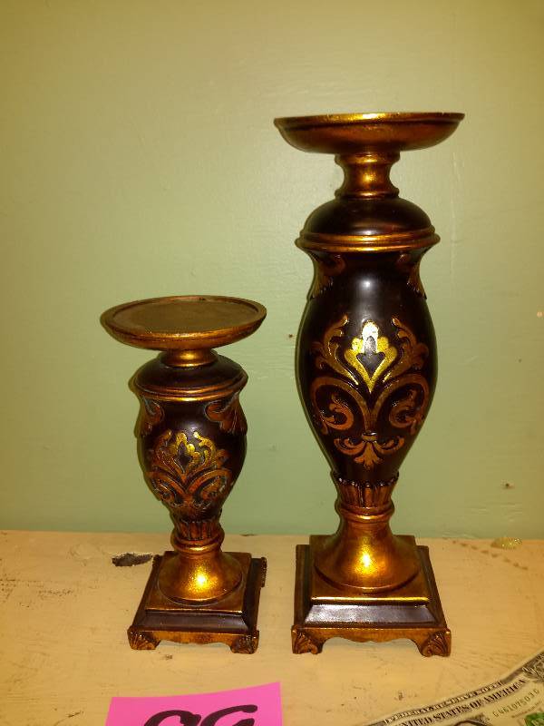 lot 89 image: 2, wooden candle stands with gold dcor.. 1, 14 in  1, 10 in
