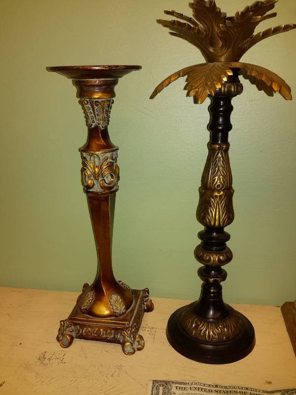 lot 90 image: 4, decorative Candle stands.  All very nice shape. Approx 14 in h