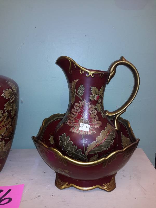 lot 86 image: 4 maroon and gold leaf design glass pieces.. 1 urn with cover, 1 vase, pitcher and bowl.. All made in China.. Decorative only.. Not for  food use.