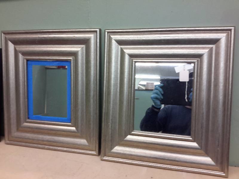 lot 97 image: 4 Accent type mirrors.  2, Black with dcor  16in x 16in  Beveled glass  Silver, 17 in x 19 in.