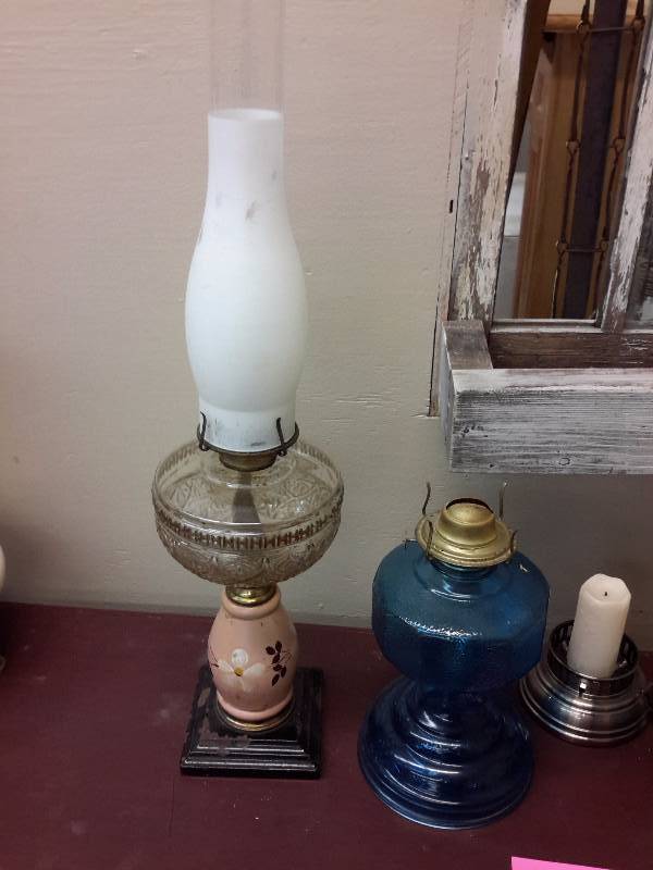 lot 103 image: 3 Kerosene lamps, 1 candle holder lamp.  Only one shade