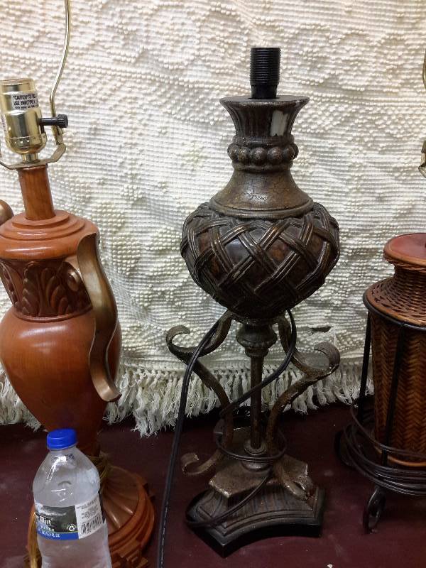 lot 109 image: 3 lamps, no shades. Middle one has no electric installed.  All approx.. 27 in h. All untested.