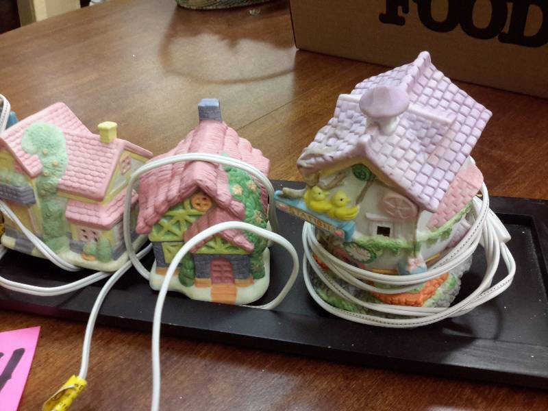 lot 134 image: Set of 5 Porcelain Easter them village buildings.. Light up.. Untested.