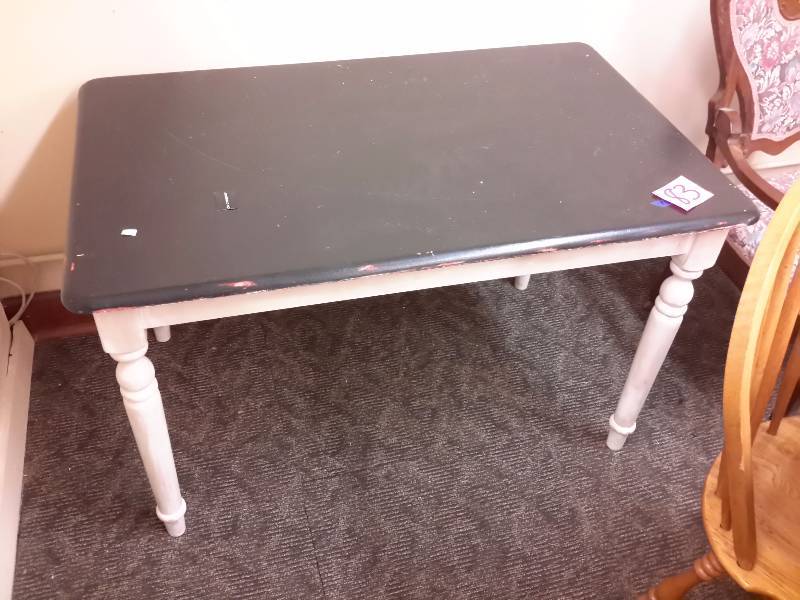 lot 83 image: Nice Solid wood table.  48 in x 30 in x 30 in h.