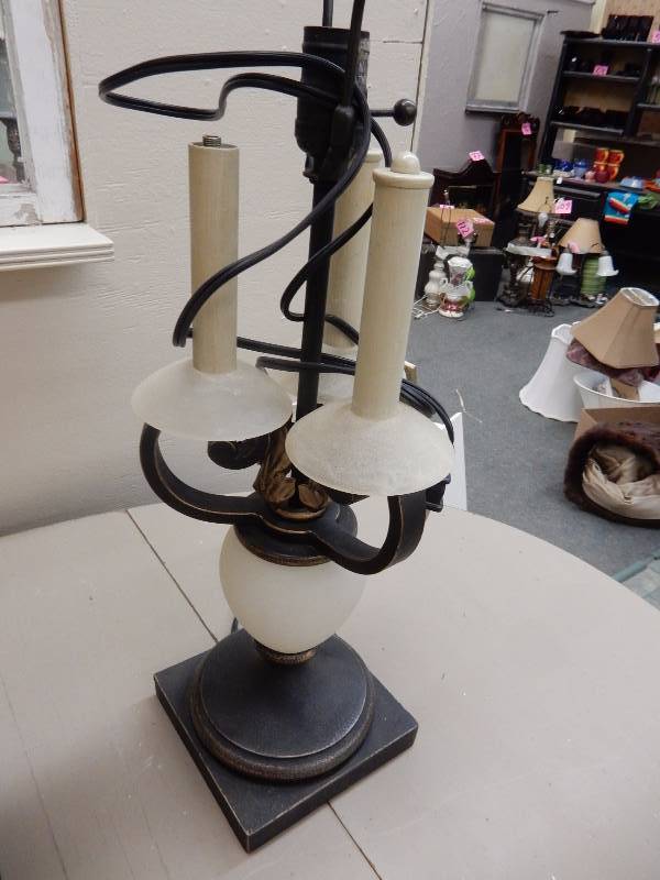lot 114 image: 2 nice table lamps.. One cap to the dcor spike missing.. 25in Untested
