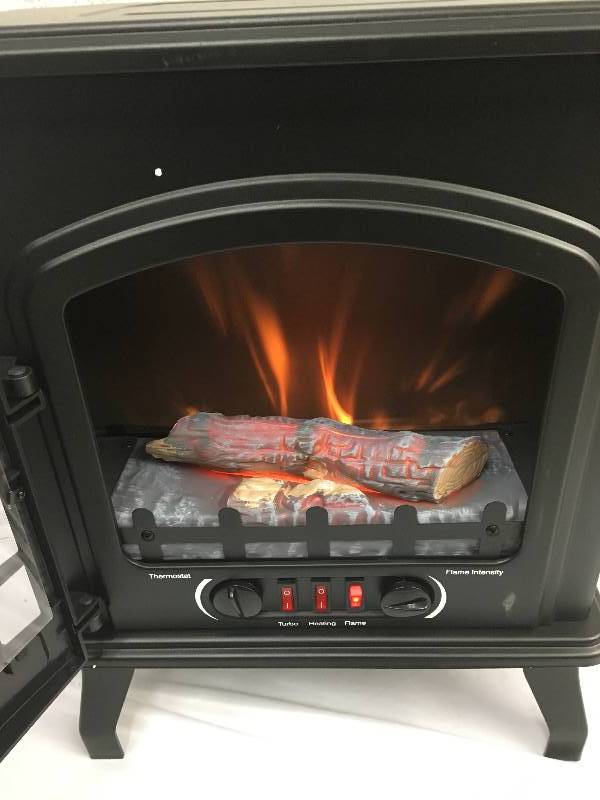 lot 25 image: Randall Electric Wood Heater Retail $150