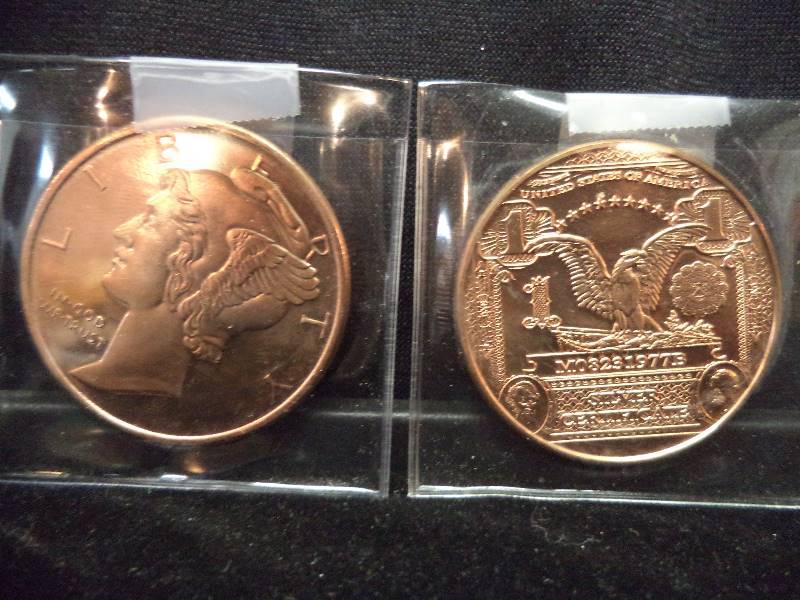 Lot - 2 Copper Tokens (2 oz total)