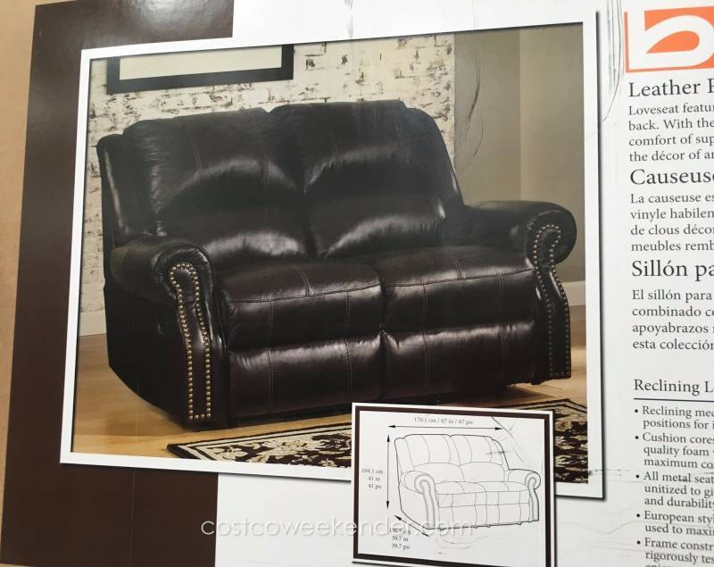 lot 2 image: Berkline Reclining Leather Loveseat New- Slight damage on Arm see Pictures