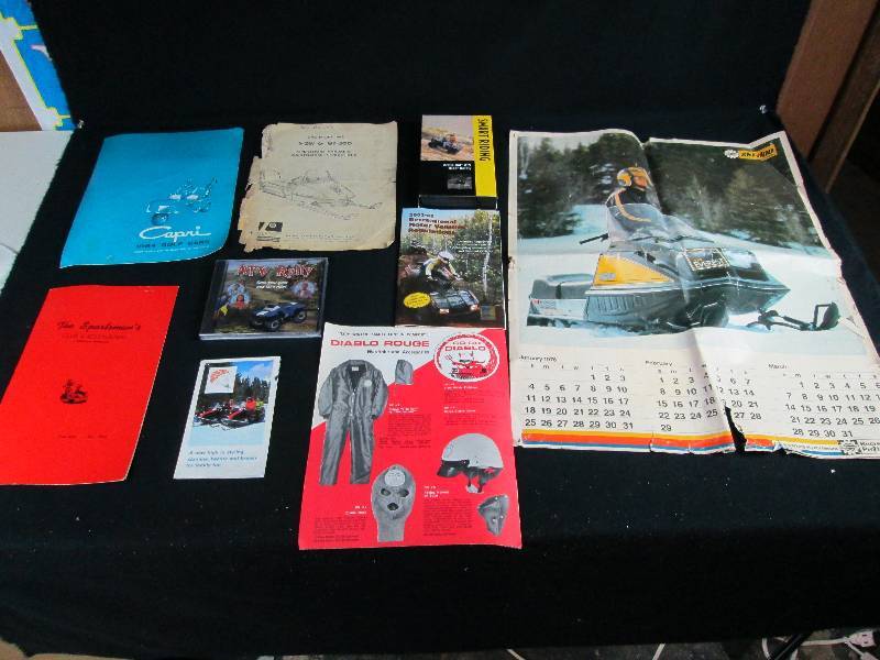 lot 229 image: Vintage Snowmobile Advertisement