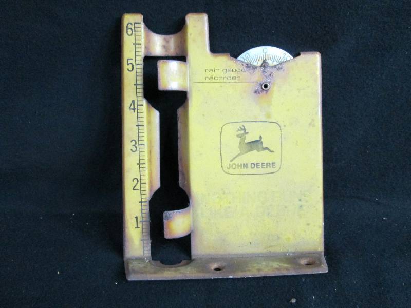 lot 234 image: John Deere Rain Gage.