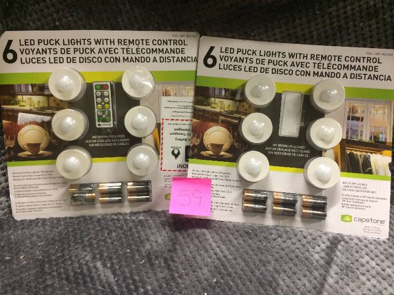 lot 59 image: Lot of 2 LED Puck Lights - one missing remote New