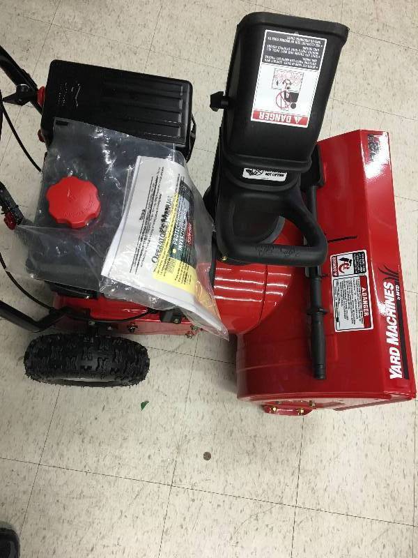 lot 1 image: Yard Machines 179cc OHV 4-Cycle Gas Powered 22-Inch Self Propelled Two-Stage Snow Thrower retail $760