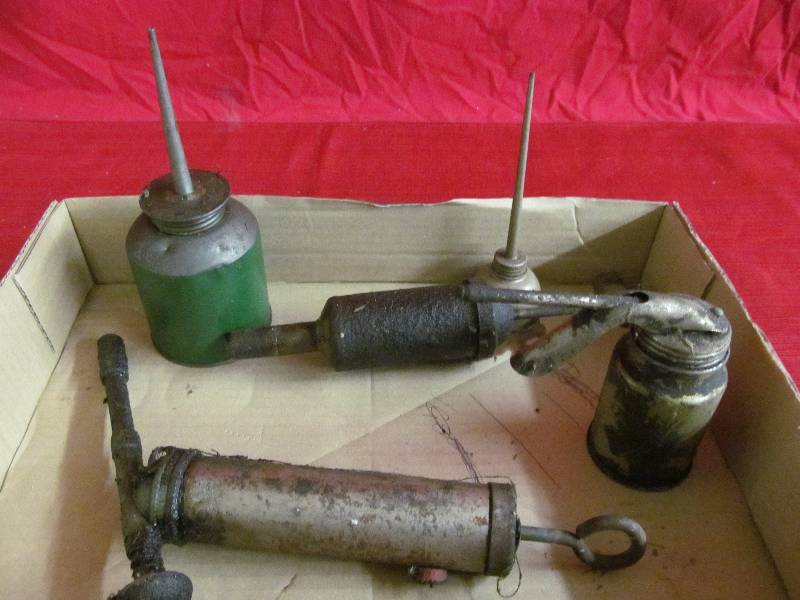 lot 151 image: vintage oil containers