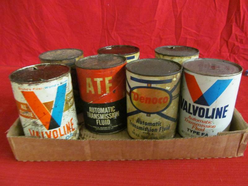 lot 155 image: vintage oil containers