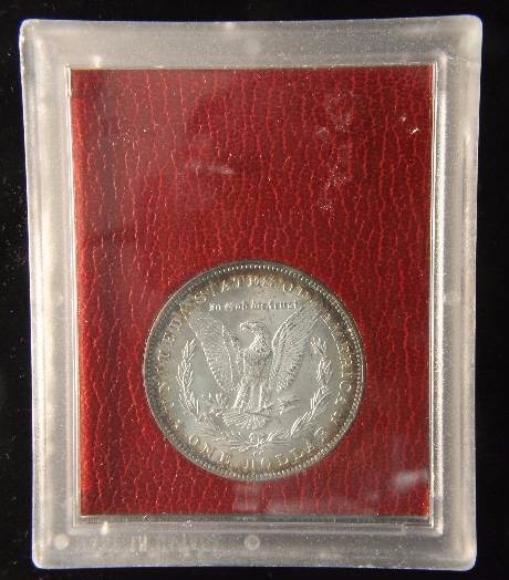 EXTREMELY RARE 1891CC MS65 REDFIELD MORGAN DOLLAR IN ORIGINAL PARAMOUNT RED HOLDER
