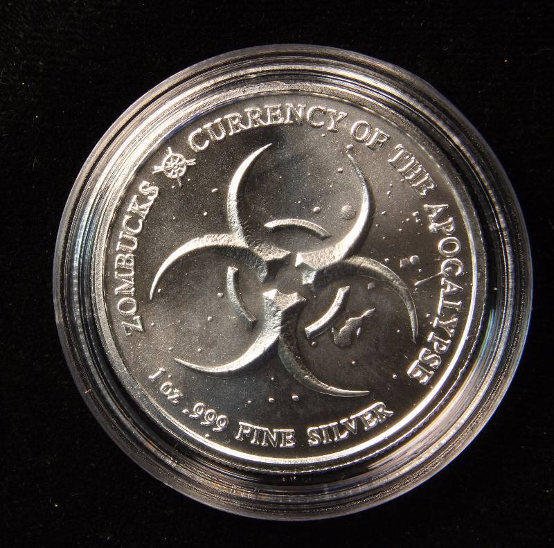 1 TROY OZ. .999 FINE SILVER ZOMBUCKS THE SAINT APOCALYPSE ROUND IN AIRTITE HOLDER