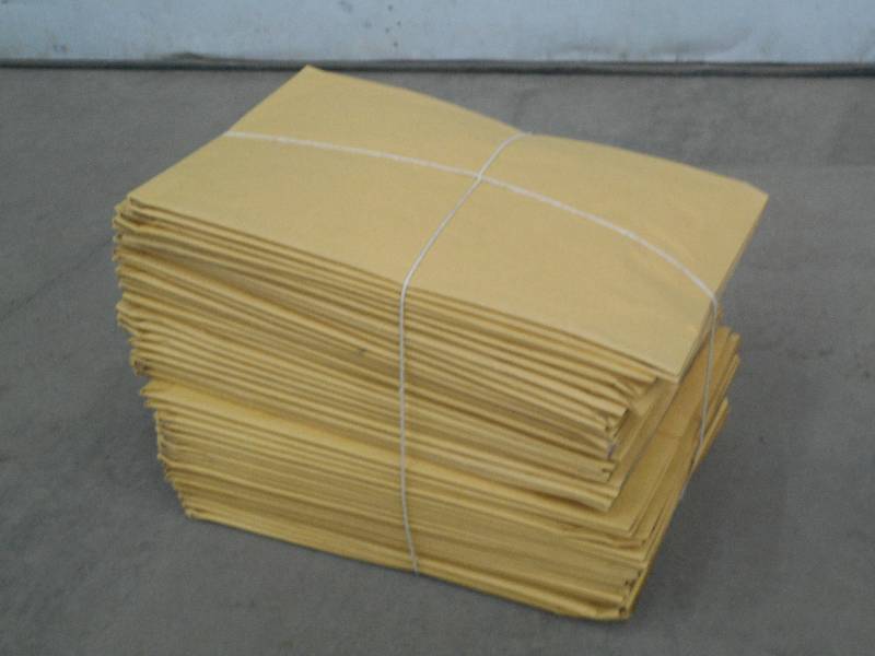 Stack Of #5 Manilla Padded Shipping...