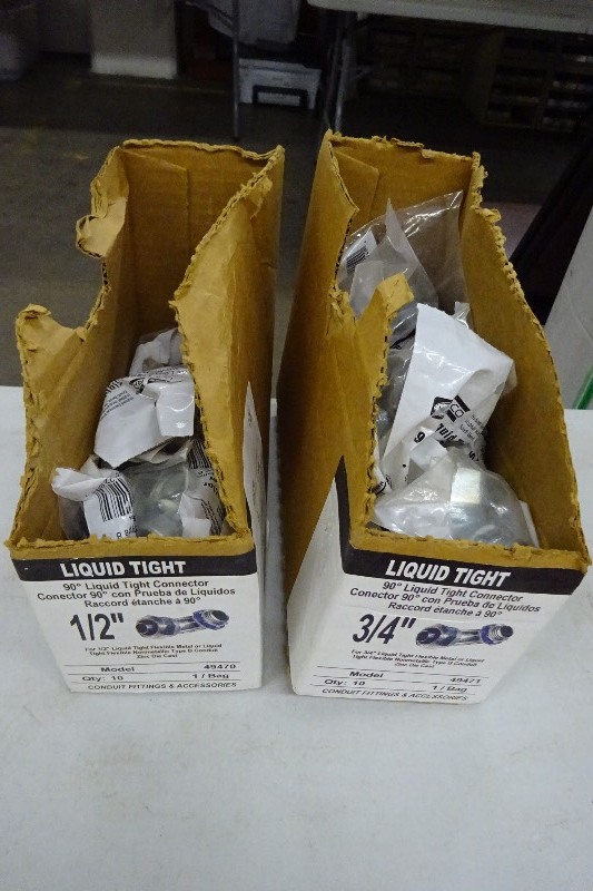 Liquid tight connectors 12 abd 34