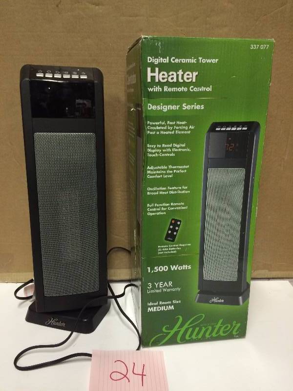 lot 24 image: Hunter 24 in. 1500-Watt Digital Ceramic Tower Heater Like new no remote