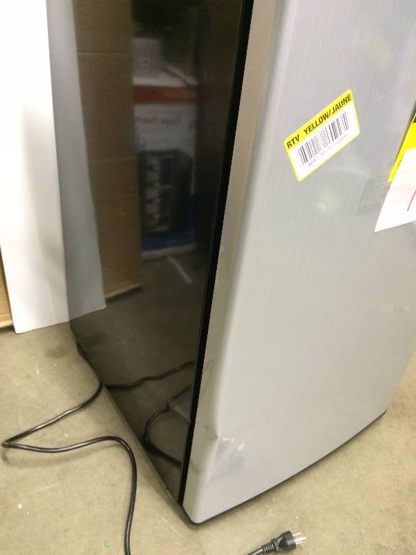 lot 17 image: Magic Chef 4.4 cu. ft. Mini Refrigerator in Stainless Look New few dents Model HMBR440SE