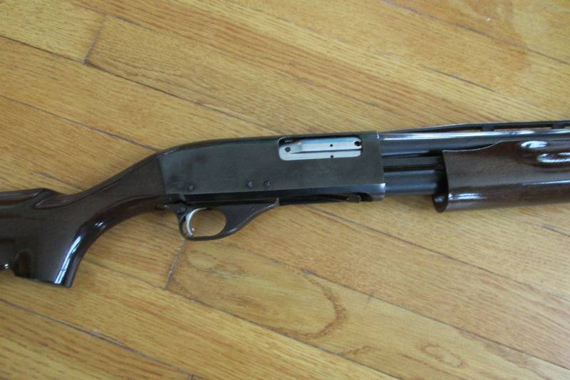lot 3 image: Magteech 12 Guage 2 34 and 3 IN shotgun
