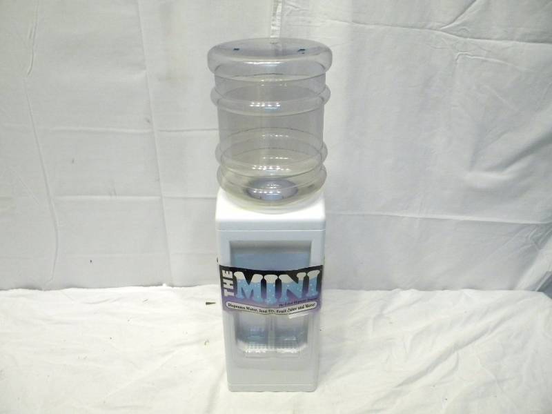 lot 225 image: Mini Bottle Dispenser