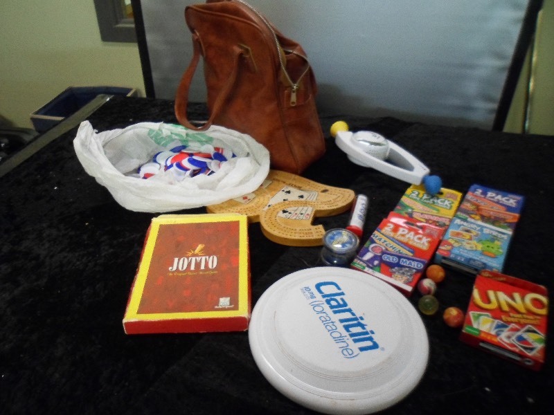 lot 81 image: Vintage Travel Bag filled with Games