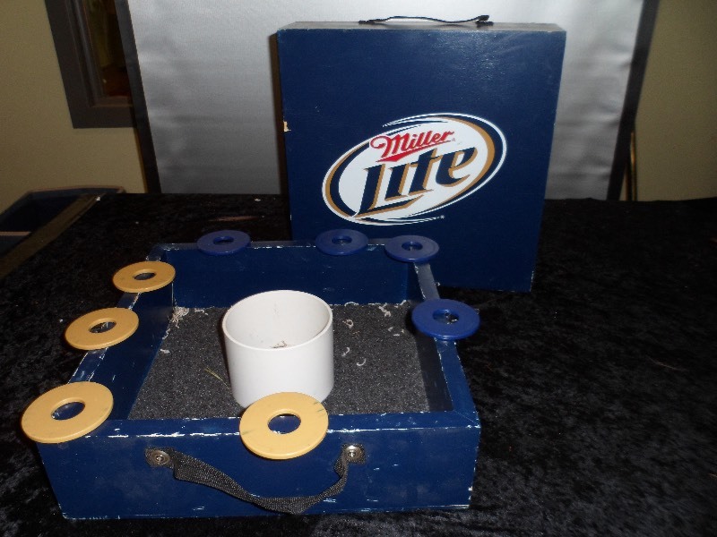lot 83 image: Ring Toss Lawn Game in Miller Lite Case